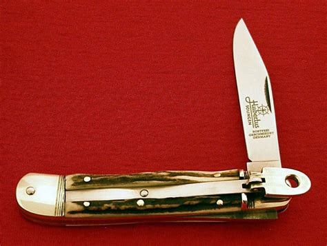 Hubertus Solingen Guardian Stag Springer Automatic Knife with Swing Guard. . Hubertus solingen knife price